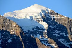 09 The Light Of Sunrise Quickly Changes To White On Mount Temple Close Up From Lake Louise Village.jpg